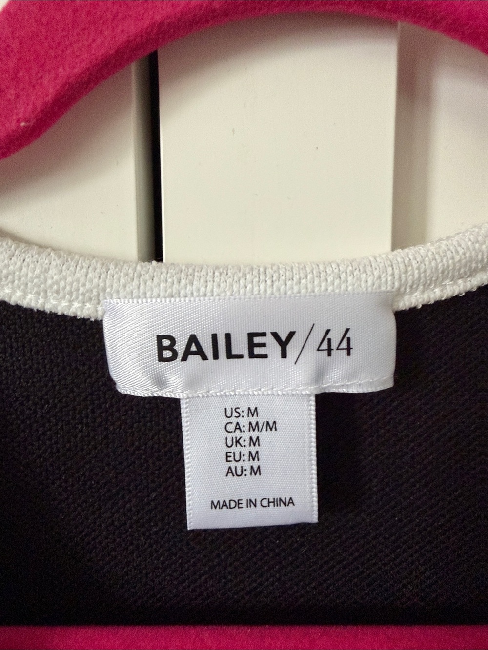 Bailey 44 Black Sleeveless Knit Vest with Cream Trim and Gold Buttons - Picture 2 of 4